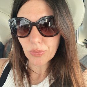 Prada tortoise shell sunglasses round